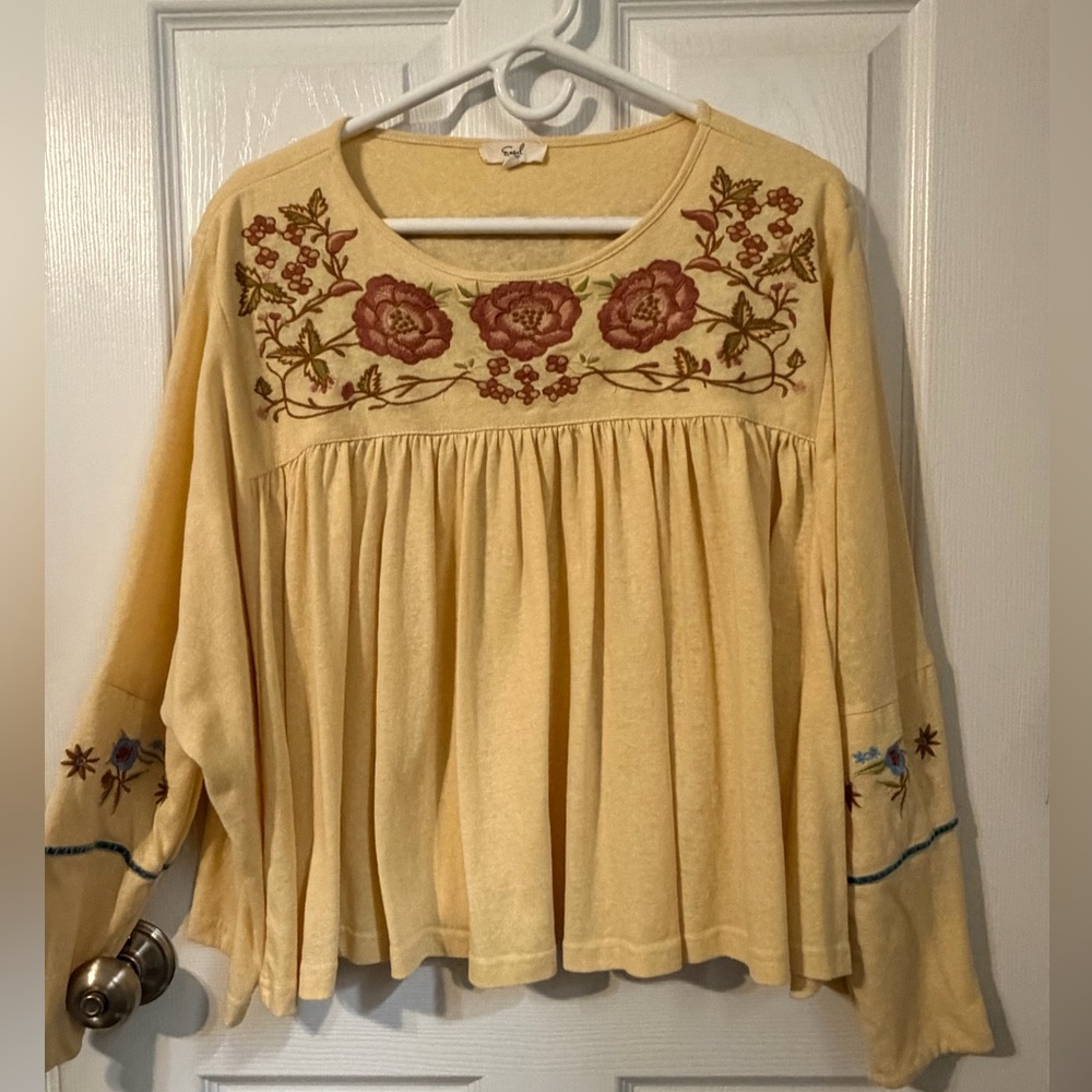 Easel cropped flare embroidered top